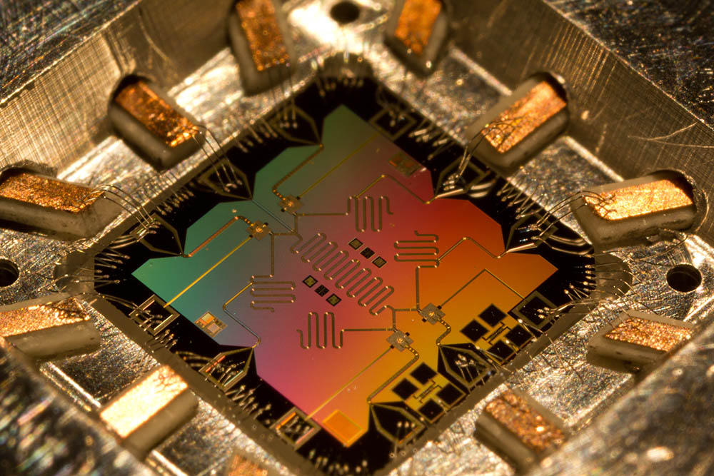 A quantum computer chip can process information several orders of magnitude faster than an ordinary silicon computer chip. Photo credit: Erick Lucero.